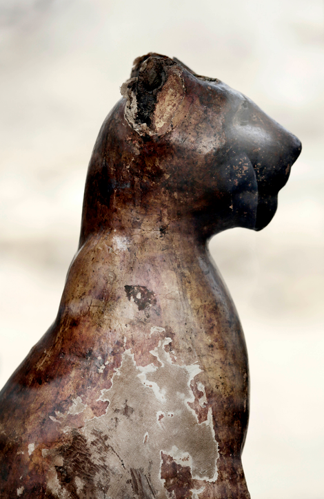One of many wooden cat statues found in the tomb.